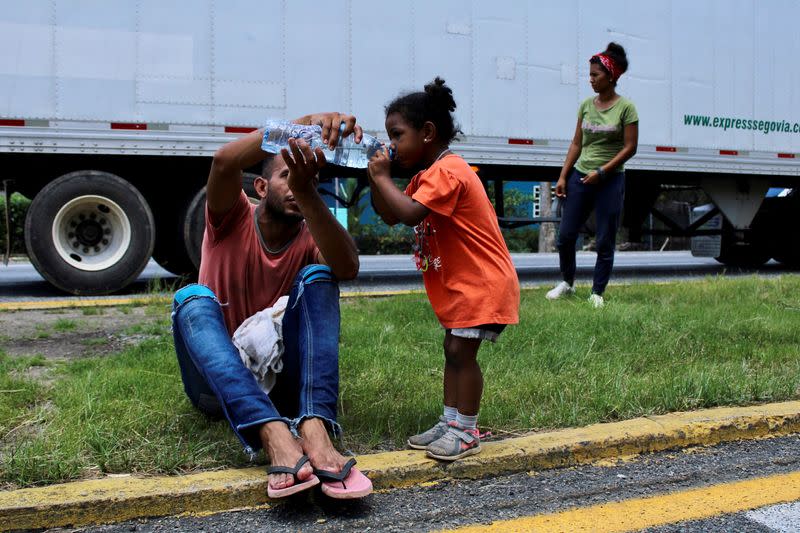 Venezuelans take part in a caravan toward the U.S., in Tapachula