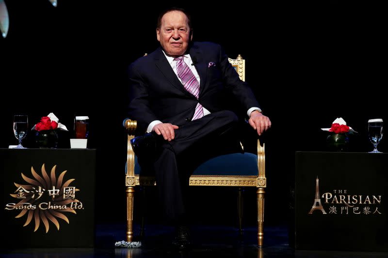 FILE PHOTO: Las Vegas Sands Corp Chairman and Chief Executive Sheldon Adelson attends a news conference on the opening of Parisian Macao in Macau