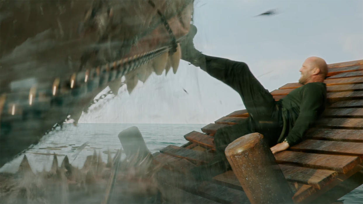  Jason Statham pushing a Megalodon back with his boot in Meg 2 The Trench. 