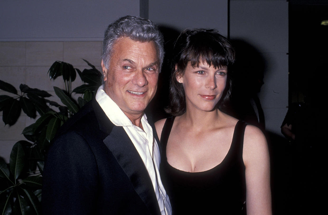 Actor Tony Curtis and actress Jamie Lee Curtis attend Tony Curtis' Art Exhibition Dinner Party on April 22, 1989 at Beverly Hilton Hotel in Beverly Hills, California. (Photo by Ron Galella, Ltd./Ron Galella Collection via Getty Images)