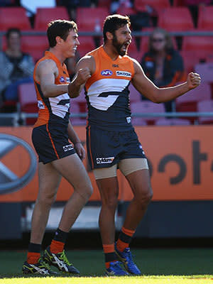 Setanta O'hAilpin of the Giants celebrates a goal during the round nine AFL match between the Greater Western Sydney Giants and the West Coast Eagles at Skoda Stadium on May 25, 2013 in Sydney, Australia.