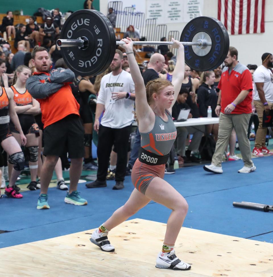 University High's Hailey Theodore makes a lift, Thursday February 1, 2024 during girls weightlifting regionals at Flagler Palm Coast High School.