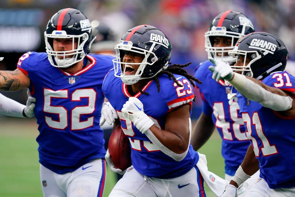 New York Giants running back Gary Brightwell (23) celebrates with teammates after recovering a muffed punt by the Chicago Bears in the fourth quarter. The Giants defeat the Bears, 20-12, at MetLife Stadium on Sunday, Oct. 2, 2022, in East Rutherford.