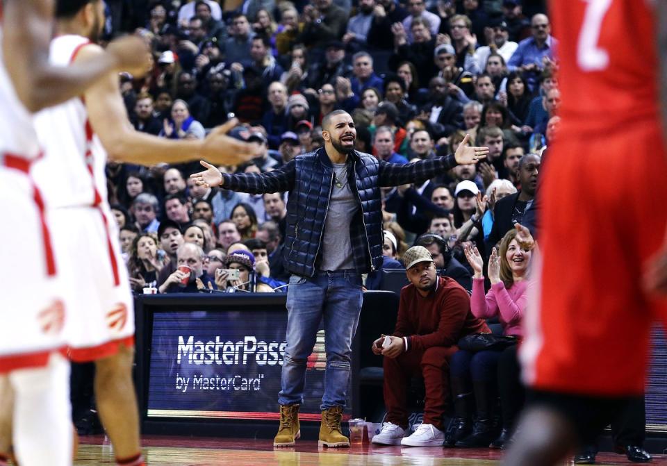 30 Photos of Celebrities Looking Cool as Hell at NBA Games