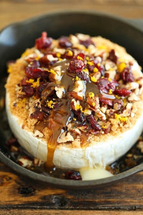 <strong>Get the <a href="http://damndelicious.net/2015/11/22/cranberry-pecan-baked-brie/?m" target="_blank">Cranberry Pecan Baked Brie recipe</a> from Damn Delicious</strong>