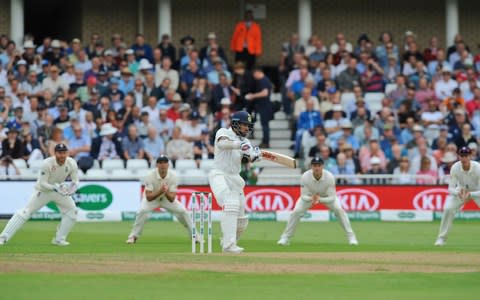 Shikhar Dhawan on the front foot - Credit: AP