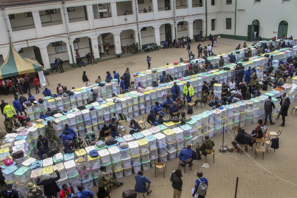 Ballot boxes lie stacked in rows at a tallying center in Nairobi, Kenya Wednesday, Aug. 10, 2022. Kenyans are waiting for the results of a close but calm presidential election in which the turnout was lower than usual. (AP Photo)