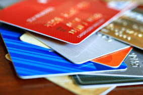 Colorful stack of credit cards and shopping gift cards.  Macro with extremely shallow dof.