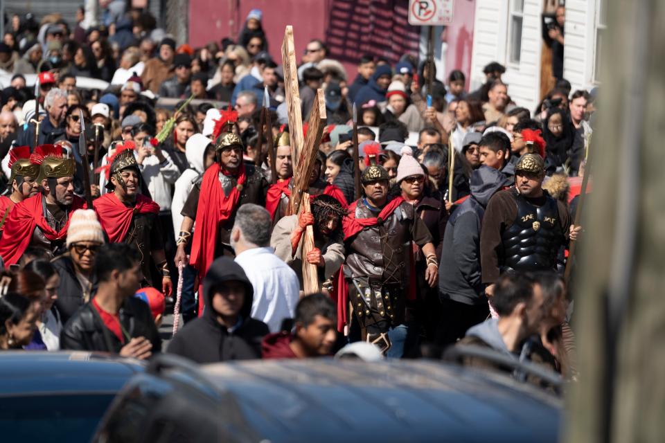 Mar 29, 2024; Paterson, NJ, USA; The Stations of the Cross journey on Marshall Street in Paterson as part of a dramatic reenactment of the Passion of Christ presented by the Cathedral of St. John the Baptist in Paterson.