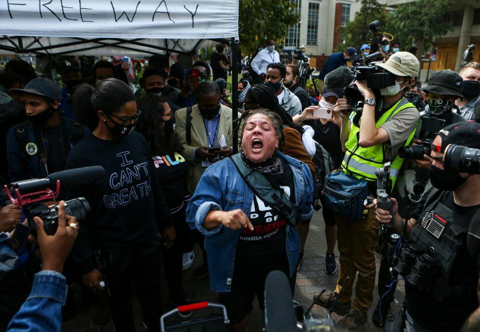 A Breonna Taylor supporter at Jefferson Square angrily reacts after the grand jury in the Taylor case indicts just one LMPD officer -- Former detective Brett Hankison was indicted on three counts of first-degree wanton endangerment. Sgt. Jonathan Mattingly and Detective Myles Cosgrove were not indicted.