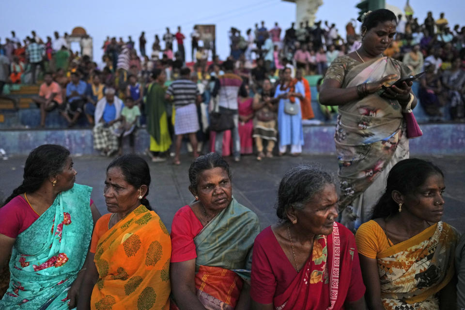 People gather to watch sunrise at Kanyakumari, southernmost point of India, Monday, April 22, 2024. (AP Photo/Manish Swarup)