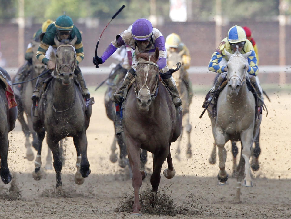 I'll Have Another with jockey Mario Gutierrez (C) in the irons wins the 138th Kentucky Derby ahead of Bodemeister at Churchill Downs in Louisville, Kentucky, May 5, 2012. REUTERS/Jeff Haynes