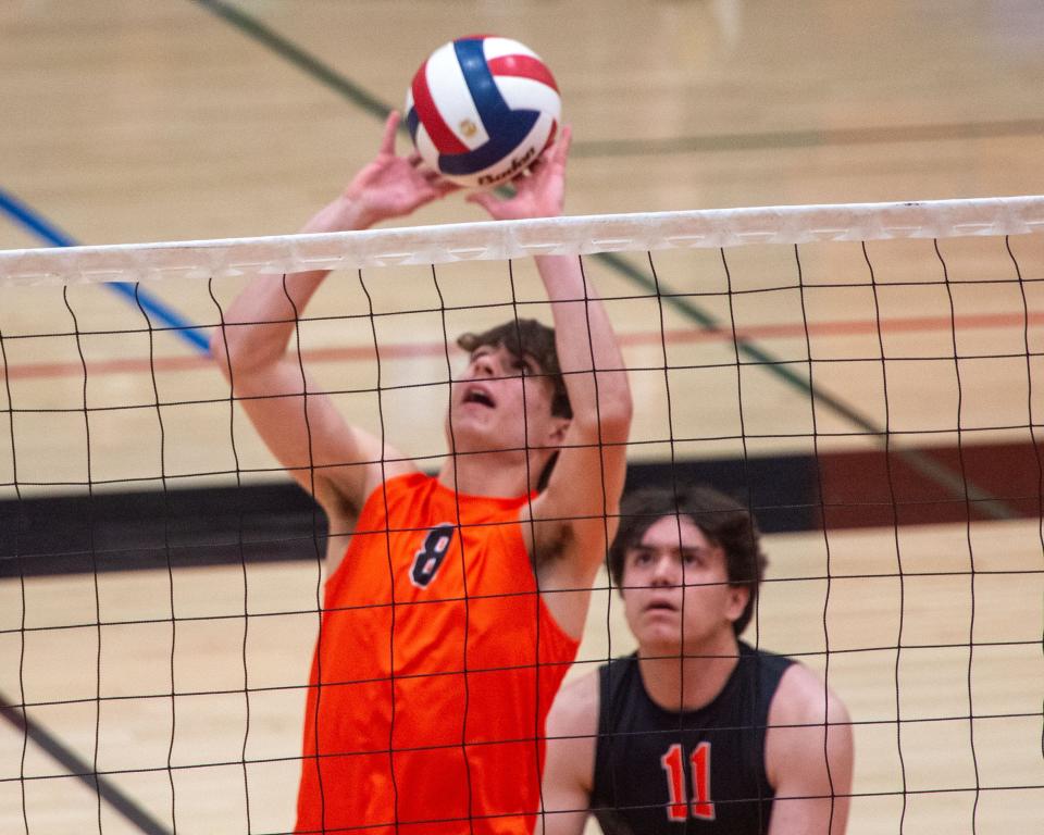 Northeastern’s Ryan Kinney (8) sets the ball as Gavin Meador watches in a pool play match of the Koller Classic at Central York on Saturday, April 15, 2023. Northeastern defeated Central York for the title.
