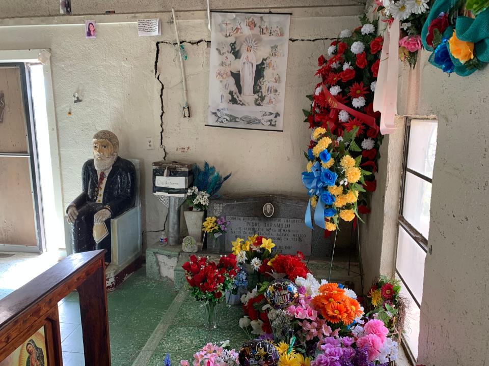 The shrine to Don Pedro Jaramillo, the "Healer of Los Olmos," lies just outside Falfurrias, Texas. The faithful leave photos of their sick relatives on the walls of the shrine.