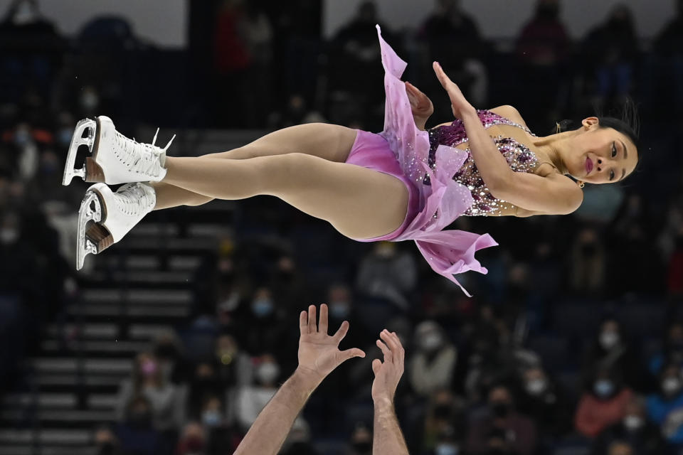 FILE - Jessica Calalang and Brian Johnson compete in the pairs free skate program during the U.S. Figure Skating Championships Saturday, Jan. 8, 2022, in Nashville, Tenn. Increasingly sensitive instruments designed to detect banned substances have the ability to pick up increasingly miniscule amounts of those substances in an athlete’s system. In some cases, athletes ingest them intentionally. But in a growing number of instances, the banned drugs enter their systems in completely unintentional ways. Calalang's positive test cost her eight months of legal wrangling and a spot at world championships in 2021. (AP Photo/Mark Zaleski, File)