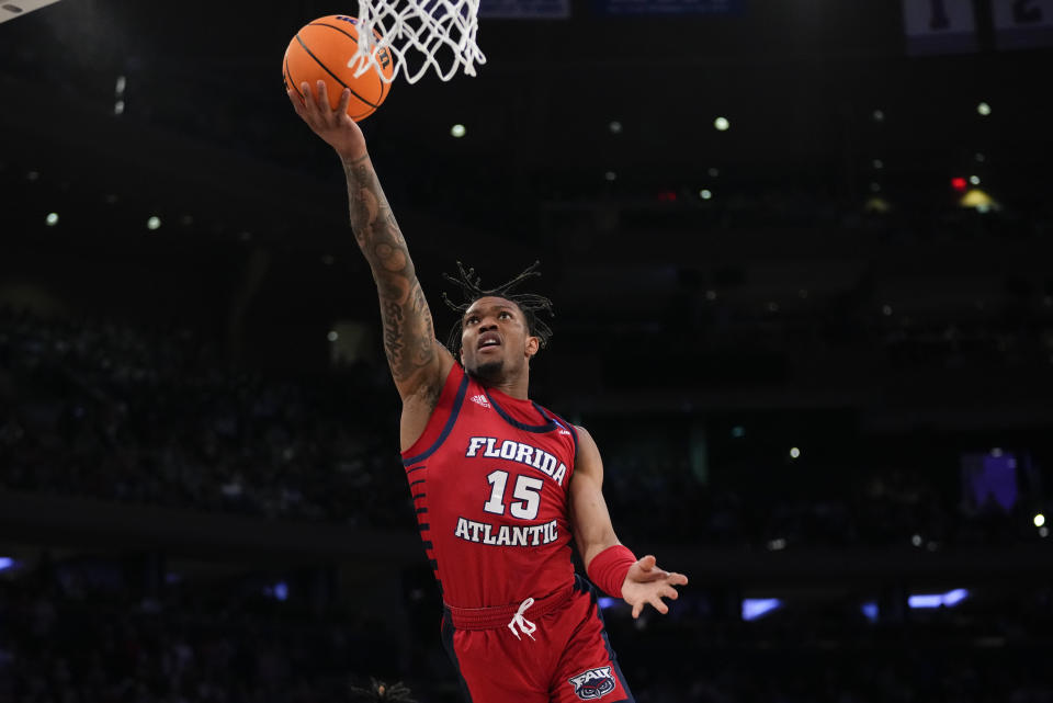 Florida Atlantic's Alijah Martin (15) goes up for a basket in the first half of an Elite 8 college basketball game against Kansas State in the NCAA Tournament's East Region final, Saturday, March 25, 2023, in New York. (AP Photo/Frank Franklin II)