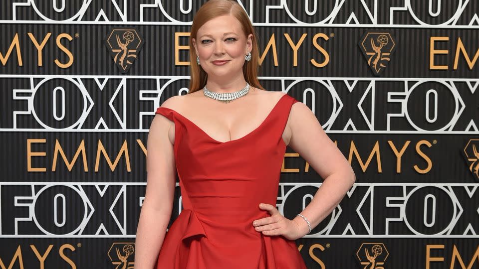 “Succession” star Sarah Snook channeled old Hollywood glamour a red Vivienne Westwood gown and diamond-encrusted Cartier jewels. - Richard Shotwell/Invision/AP