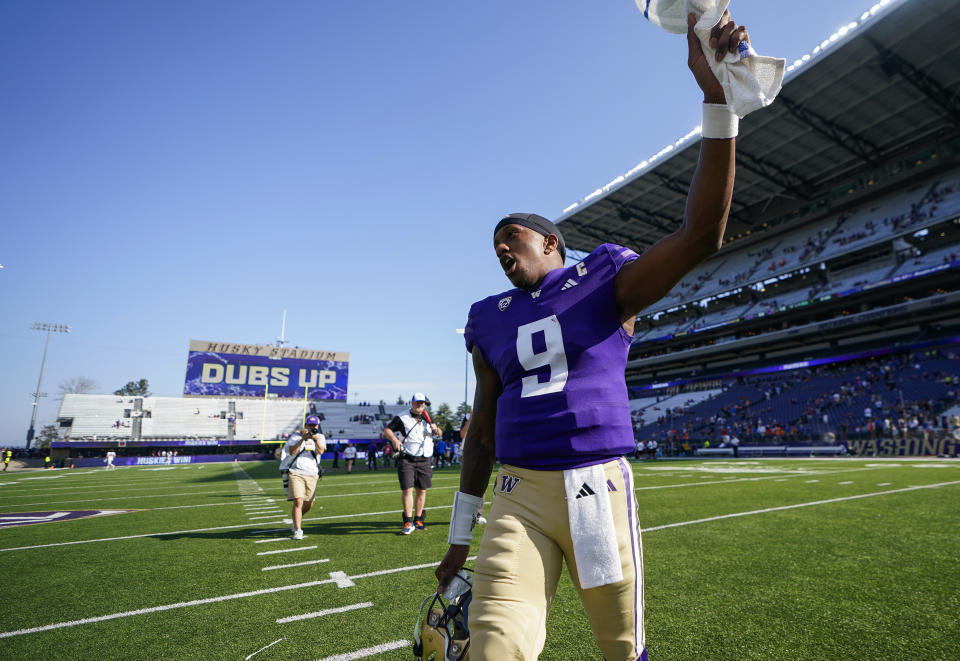 Washington quarterback Michael Penix Jr. celebrates the team's win over Boise State in an NCAA college football game Saturday, Sept. 2, 2023, in Seattle. (AP Photo/Lindsey Wasson)