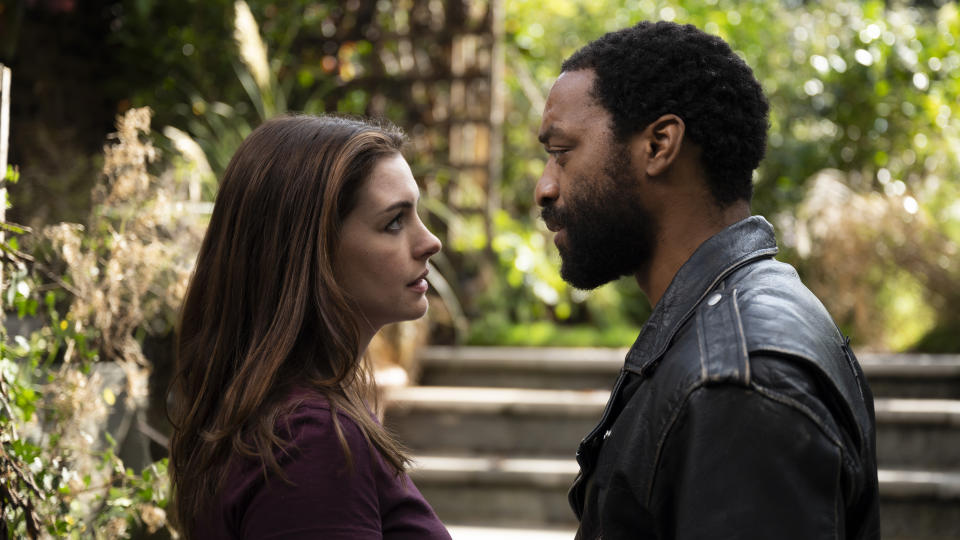 This image released by HBO Max shows Anne Hathaway and Chiwetel Ejiofor in a scene from "Lockdown." (Susie Allnutt/HBO Max via AP)