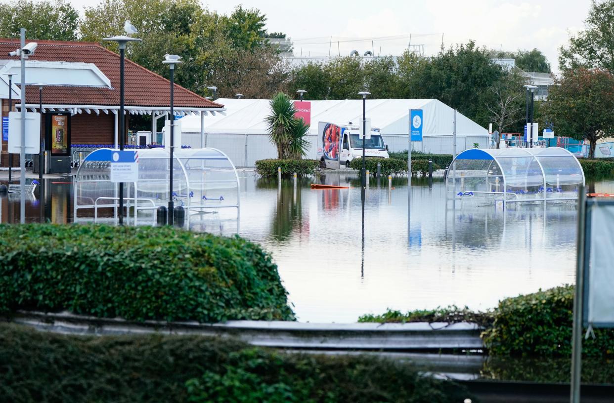 A view of the flooded car park at a Tesco store in Bognor Regis after heavy rain the area. (PA)