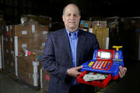 Toys 'R' Us vendor Learning Resources CEO Richard Woldenberg poses for a photo with the Teaching Cash Register at the warehouse in Vernon Hills, Illinois, U.S., March 16, 2018. REUTERS/Joshua Lott