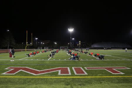 Massachusetts Institute of Technology (MIT) Engineers football players attend practice in Cambridge, Massachusetts November 13, 2014. REUTERS/Brian Snyder