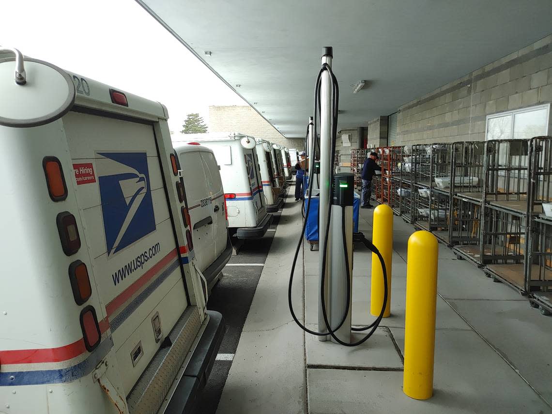 The U.S. Postal Service upgraded the parking at the Pasco mail center to accommodate more electric vehicles in the local fleet, which includes a mix of electric and gasoline delivery vehicles. Wendy Culverwell/Tri-City Herald