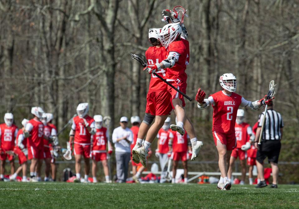 Wall Township vs Southern Regional boys lacrosse. Wall’s Shea Brennan (6) and William Madden (24) celebrate a goal.      Manahawkin, NJSaturday, April 16, 2022