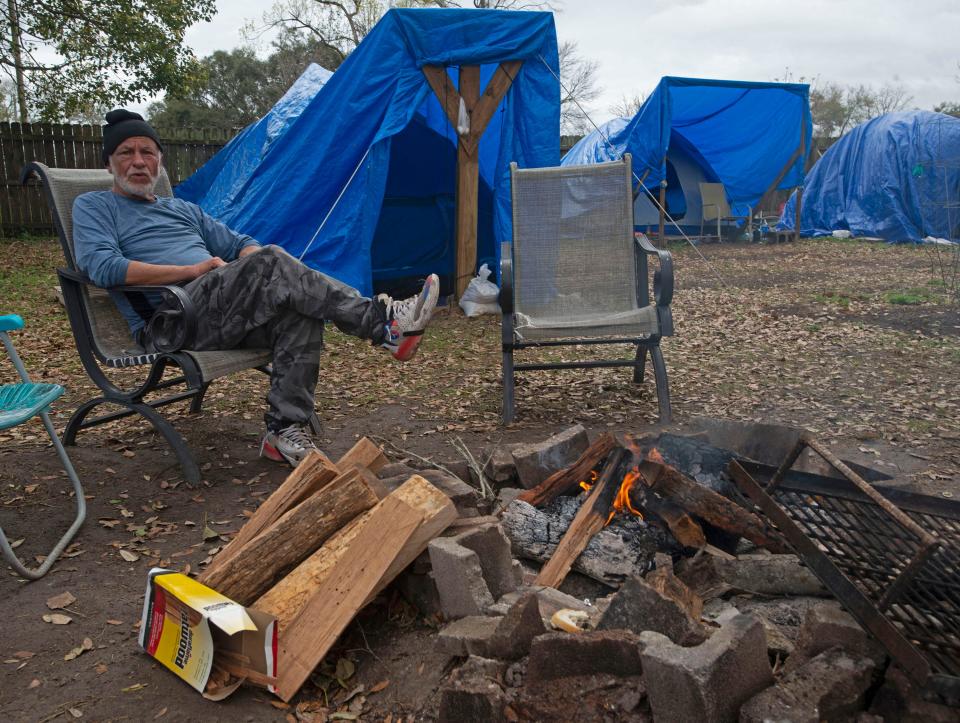 Anthony Brown shares his thoughts about the new REAP camp for the homeless on West Blount Street on Tuesday, March 15, 2022. 