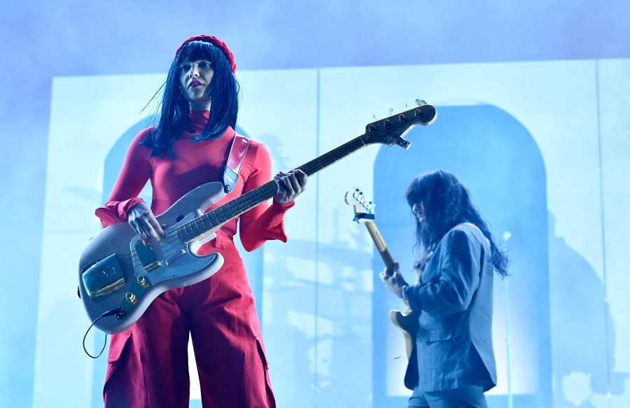 Laura Lee (L) and Mark Speer from Khruangbin perform at the Outdoor stage during the Coachella Valley Music and Arts Festival in Indio, California, on April 14, 2024. (Photo by VALERIE MACON / AFP) (Photo by VALERIE MACON/AFP via Getty Images)