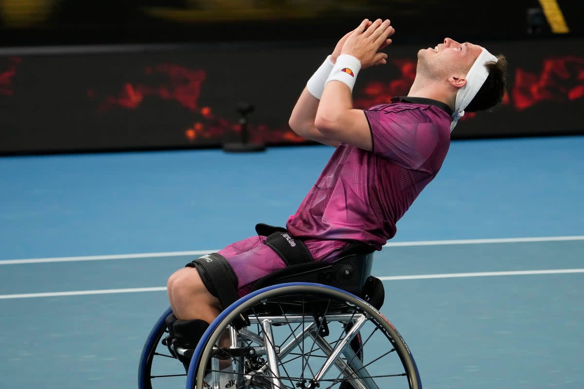 Alfie Hewett reacts after winning his first Australian Open singles title (Ng Han Guan/AP) (AP)