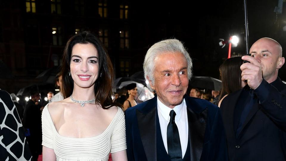 london, england december 04 anne hathaway and giancarlo giammetti attend the fashion awards 2023 presented by pandora at the royal albert hall on december 04, 2023 in london, england photo by joe mahergetty images