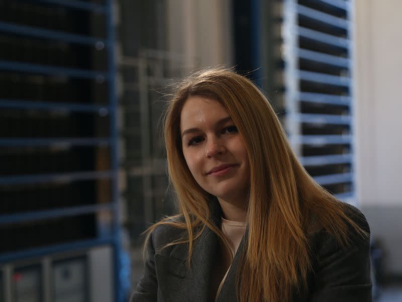 Francesca Failoni, 23, co-founder and chief financial officer at Alps Blockchain, standing in front of the bitcoin mining farm in Valstagna's hydropower plant (Sandali Handagama/CoinDesk)