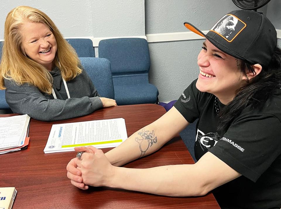 Patty Leach, left, in a one-on-one parenting session with a Lighthouse client.