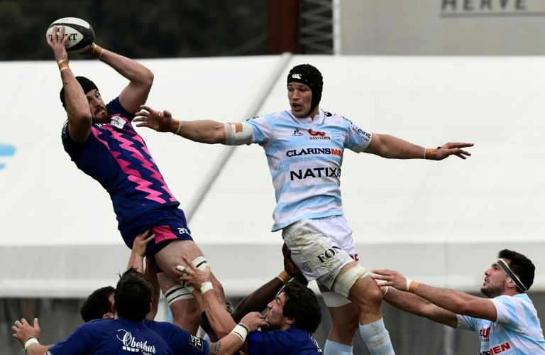 Stade Francais' Hugh Pyle (left) outjumps Racing 92's Wenceslas Lauret during a French league match in Colombes in October 2016