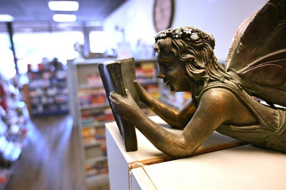 A small statuette of a fairy reading a book is seen at the Book Nook Friday, May 24, 2024 in Fresno.