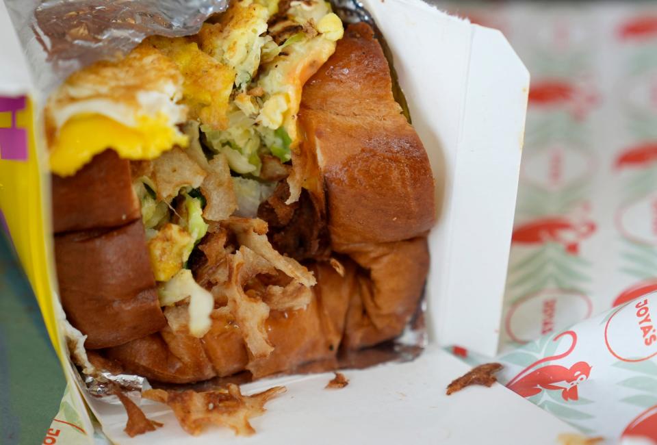 The Toast-in-a-Box at Joya's Cafe combines a Bengali omelet, pork roll, and pepperjack cheese with Korean mayo, ketchup, mustard and is wrapped in buttered and toasted bread.