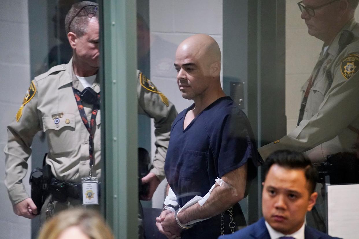 Clark County Public Administrator Robert "Rob" Telles is escorted into court, Thursday, Sept. 8, 2022, in Las Vegas. 