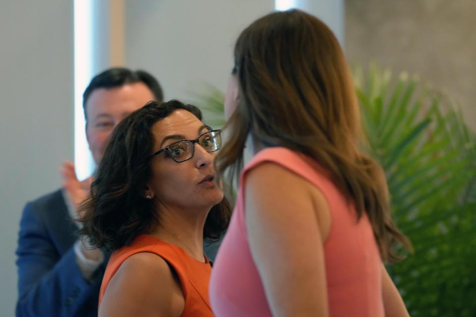 Former state Rep. Katie Arrington, left, speaks to U.S. Rep. Nancy Mace, right, after giving her public support for her campaign on Thursday, June 16, 2022, in Charleston, S.C. Mace defeated the Trump-backed Arrington in South Carolina's 1st District Republican primary on Tuesday. (AP Photo/Meg Kinnard)