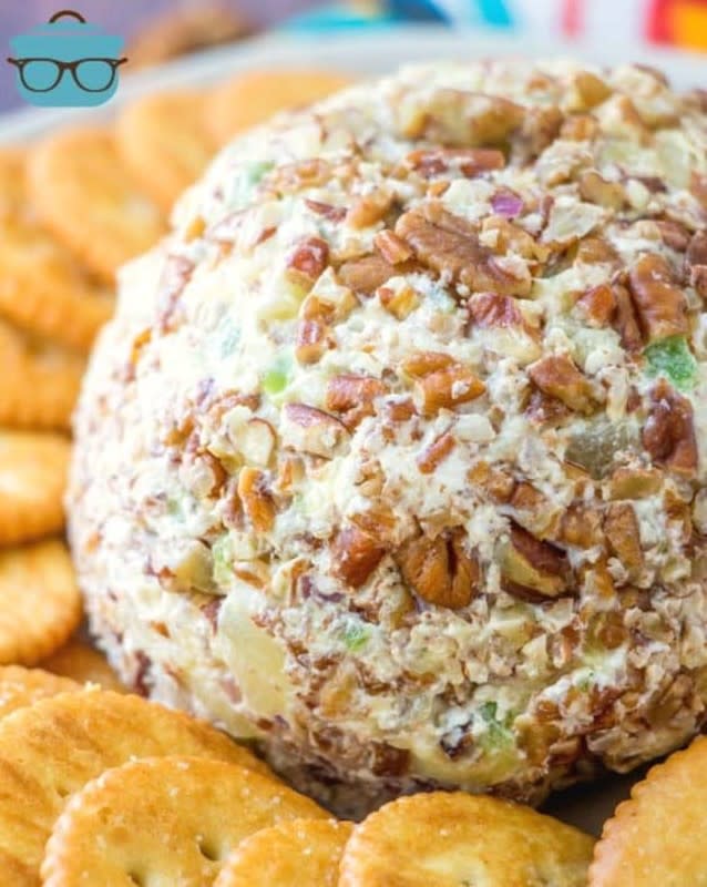<p>The Country Cook</p><p>The perfect mix of sweet, salty and cheesy!</p><p><strong>Get the recipe: <a href="https://www.thecountrycook.net/pineapple-cheeseball/" rel="nofollow noopener" target="_blank" data-ylk="slk:Pineapple Cheese Ball;elm:context_link;itc:0;sec:content-canvas" class="link rapid-noclick-resp"> Pineapple Cheese Ball</a></strong></p>