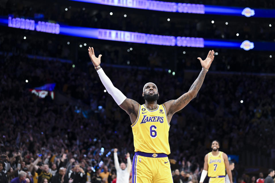 Los Angeles Lakers superstar LeBron James celebrates after setting the NBA's career scoring record Tuesday. (Wally Skalij/Los Angeles Times via Getty Images)