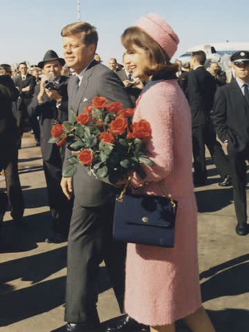 <p>Everett/Shutterstock</p> President and Jacqueline Kennedy arrive at Dallass Love Field on November 22, 1963.