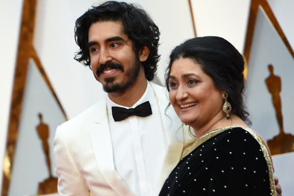 Dev Patel brought his mom to the Oscars, and now we’re even more obsessed with him