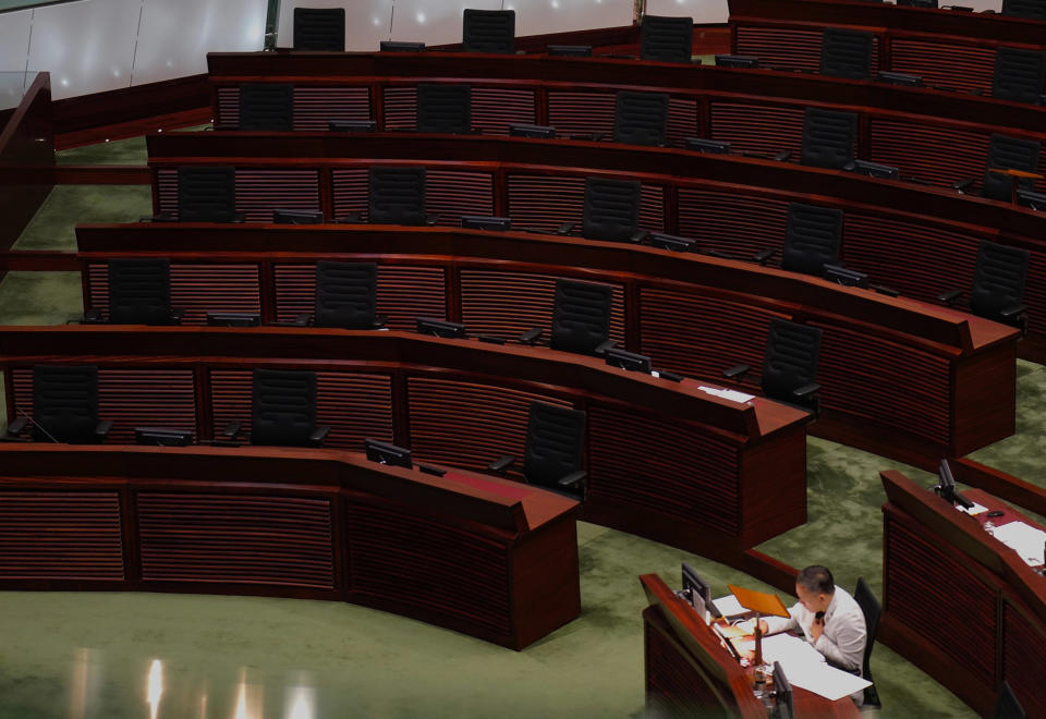 Image: Empty seats of pro-democracy legislators are seen at Legislative Chamber in Hong Kong (Vincent Yu / AP)