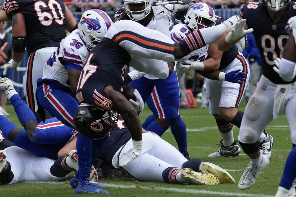 Chicago Bears' Robert Burns dives in for a two-point conversion during the second half of an NFL preseason football game against the Buffalo Bills, Saturday, Aug. 26, 2023, in Chicago. (AP Photo/Nam Y. Huh)