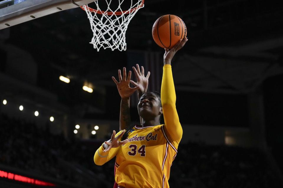 USC center Clarice Akunwafo shoots at close range against Kansas on Monday nigh.