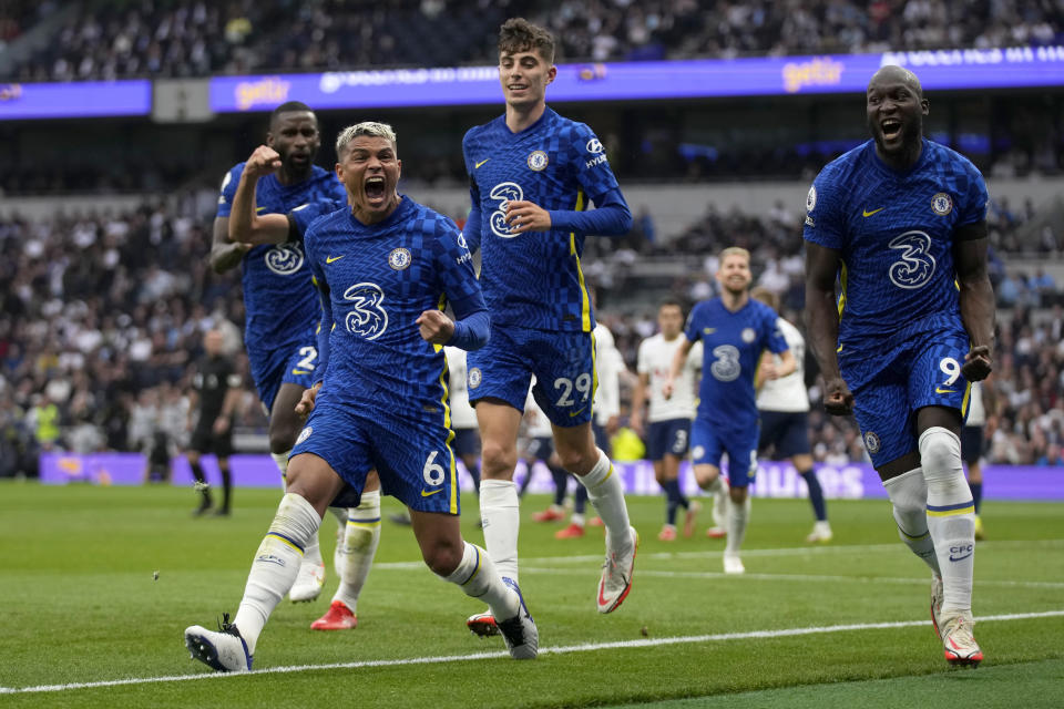 Chelsea's Thiago Silva, 2nd left, celebrates after scoring the opening goal during the English Premier League soccer match between Tottenham Hotspur and Chelsea at the Tottenham Hotspur Stadium in London, England, Sunday, Sep. 19, 2021. (AP Photo/Matt Dunham)