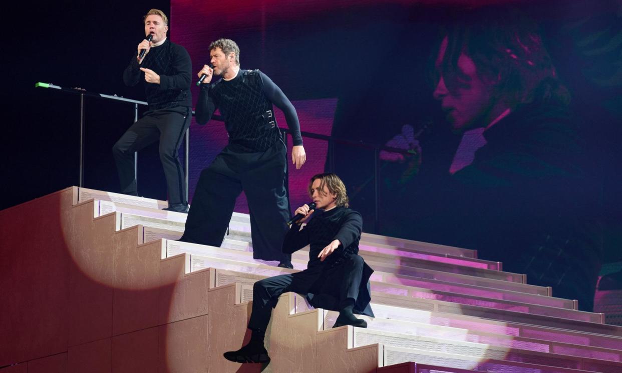 <span>Take That performing at the Utilita Arena in Sheffield for their This Life On Tour on 13 April 2024.</span><span>Photograph: Dave Hogan/Hogan Media/Rex/Shutterstock</span>