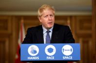 UK Prime Minister Boris Johnson holds a news conference at Downing Street in London