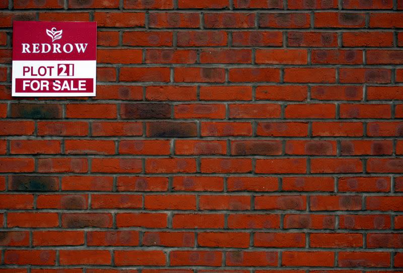 FILE PHOTO: Signage is seen on a house on a Redrow housing development in Church Greasly